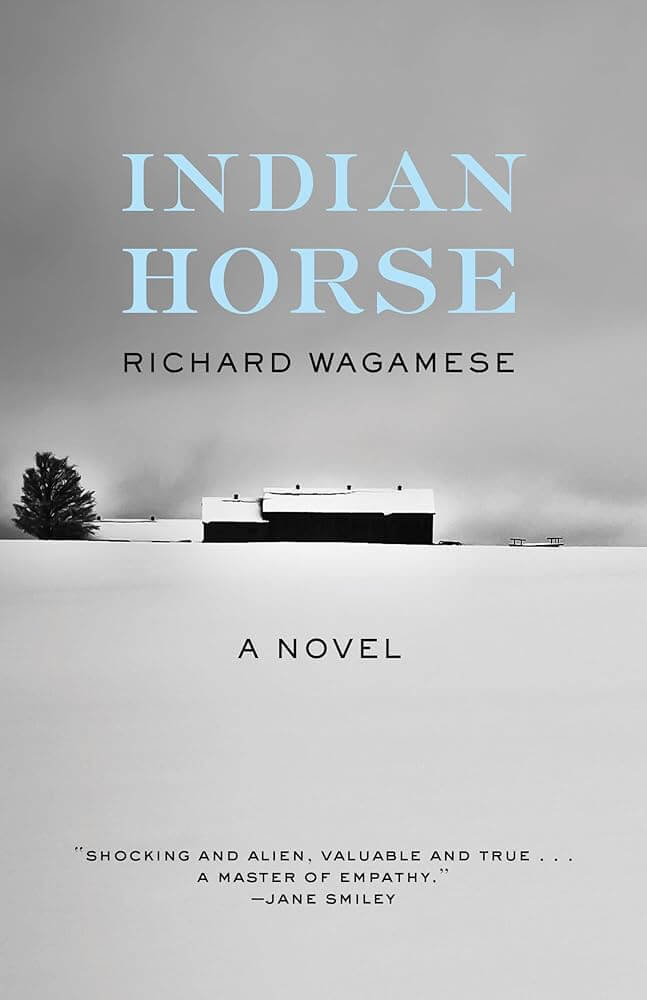 Image depicts the cover of Indian Horse by Richard Wagamese. The cover is blak and white and shows the profile of a barn on a landscape horizon.